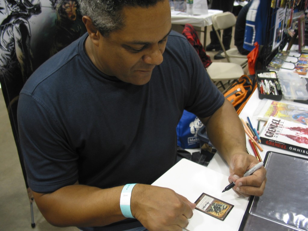 Hannibal King 001 Hannibal King signs cards for a fan at Hartford Comic Con.